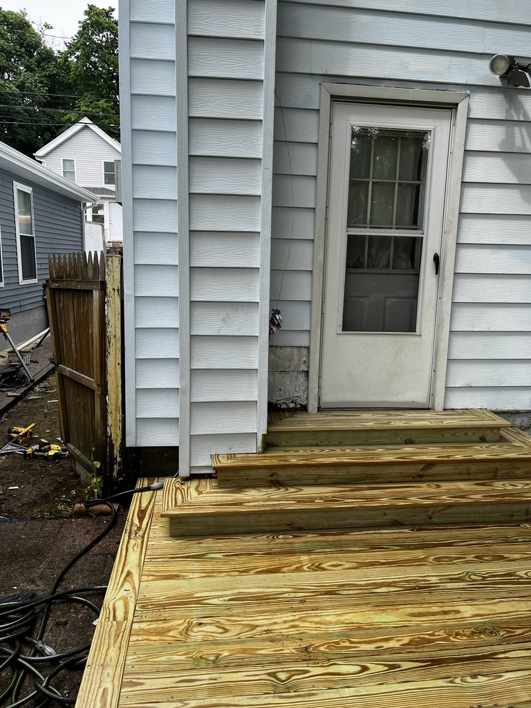 Pressure-treated wooden deck