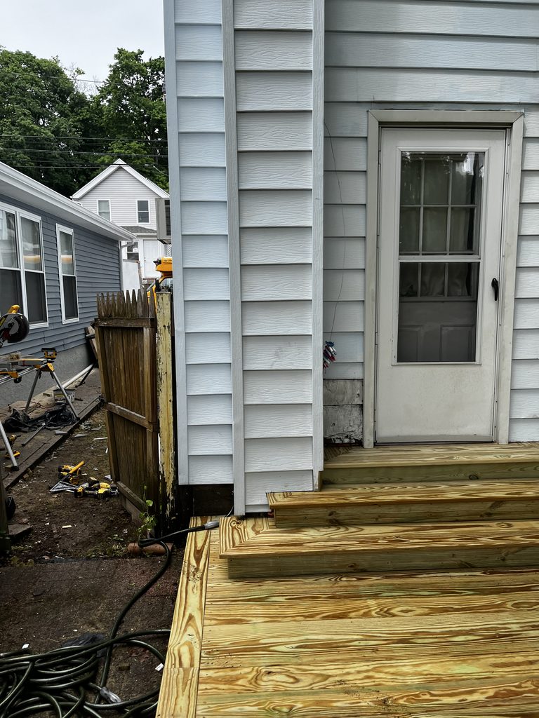 Pressure-treated wooden deck
