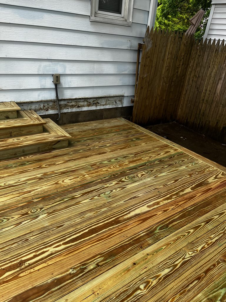 Pressure-treated wooden deck